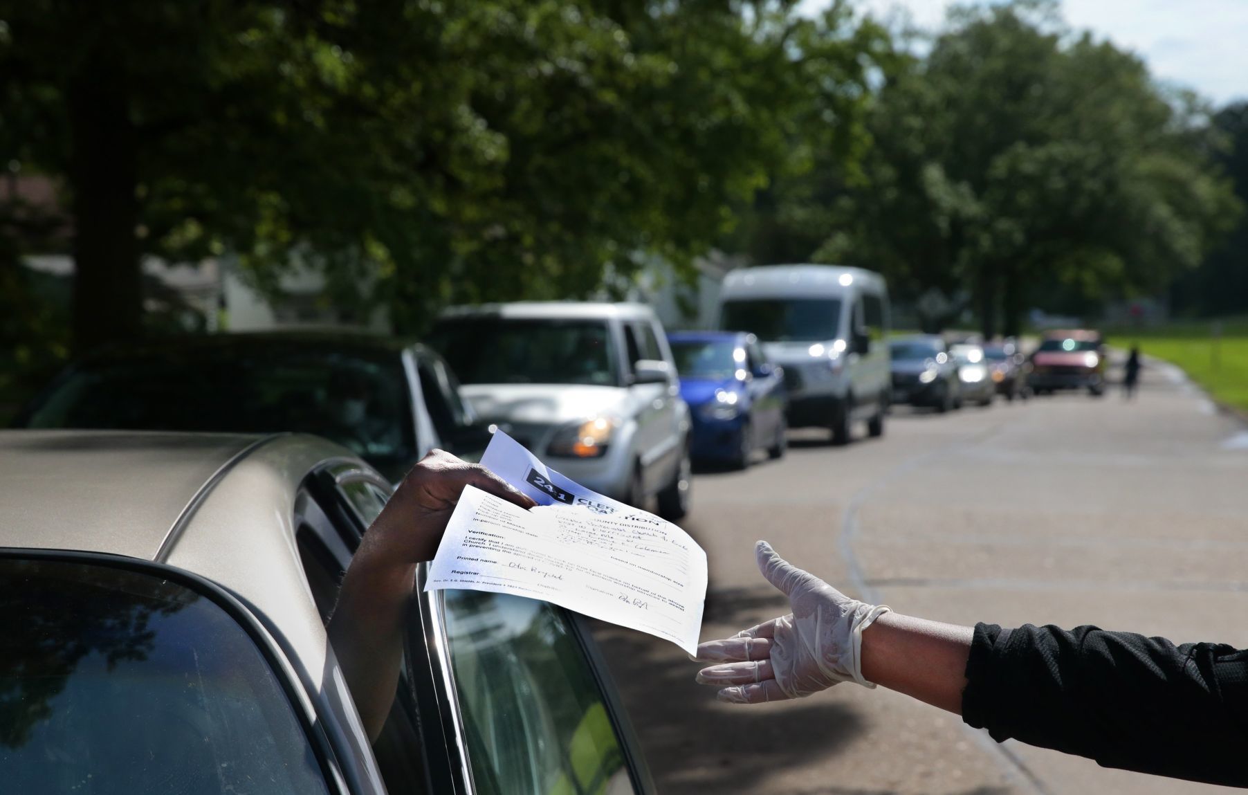 Clergy distributing masks to area churches